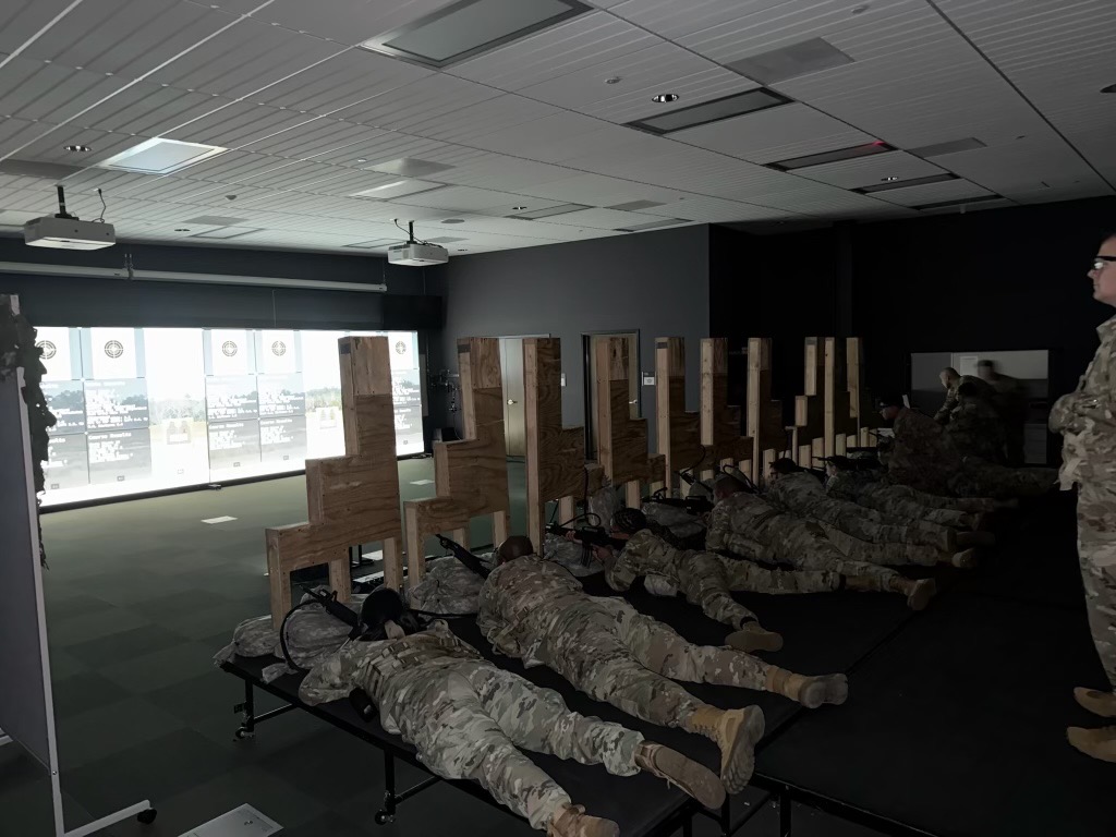 Soldiers in Class C uniforms at firing range Soldiers in Class C uniforms at firing range