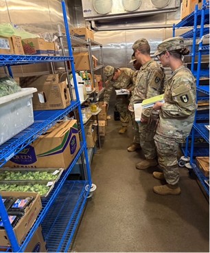 OPH conducting dining facility inspection with 172nd Preventive Medicine Detachment
